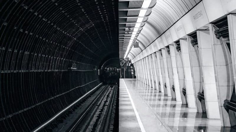 people walking on tunnel during daytime